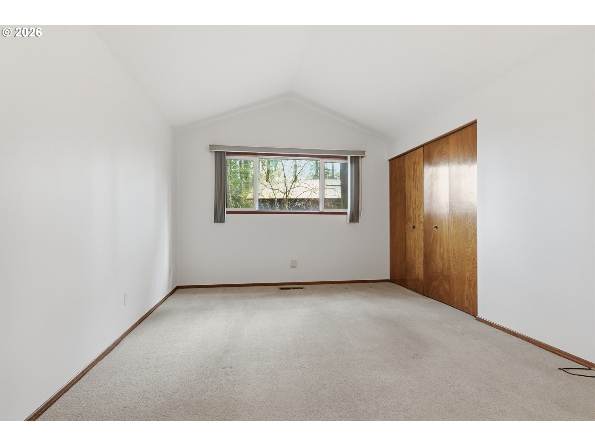 7250 Southwest 28th Court Beaverton, OR 97008 - Photo 28 of 45 an empty room with windows