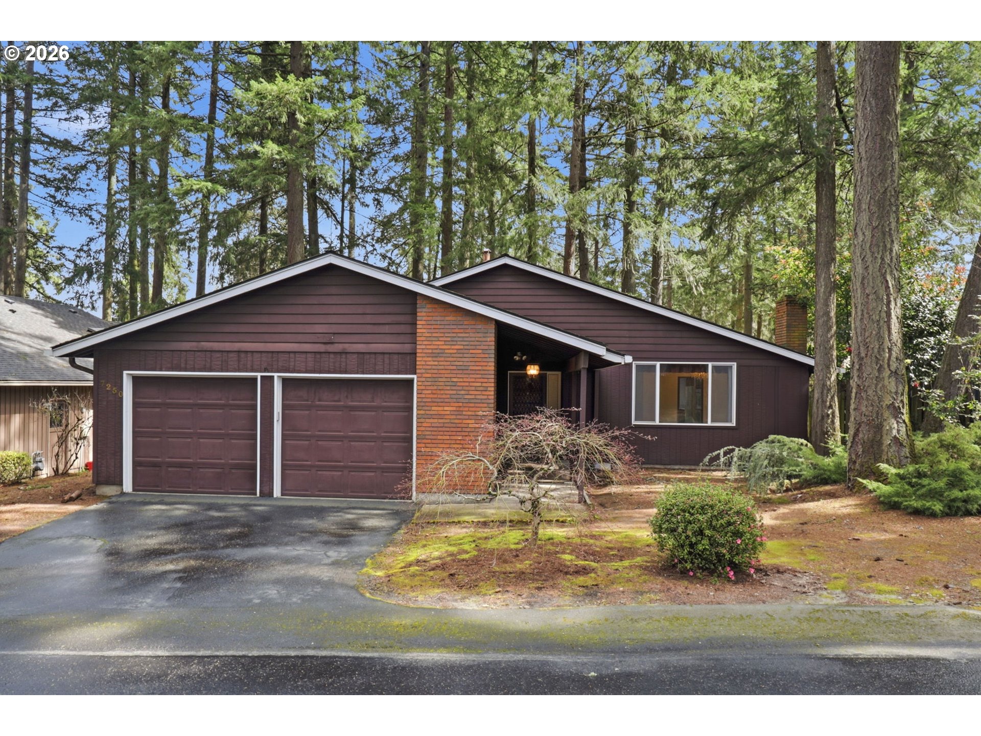 7250 Southwest 28th Court Beaverton, OR 97008 - Photo 3 of 45 a backyard of a house with yard and outdoor seating