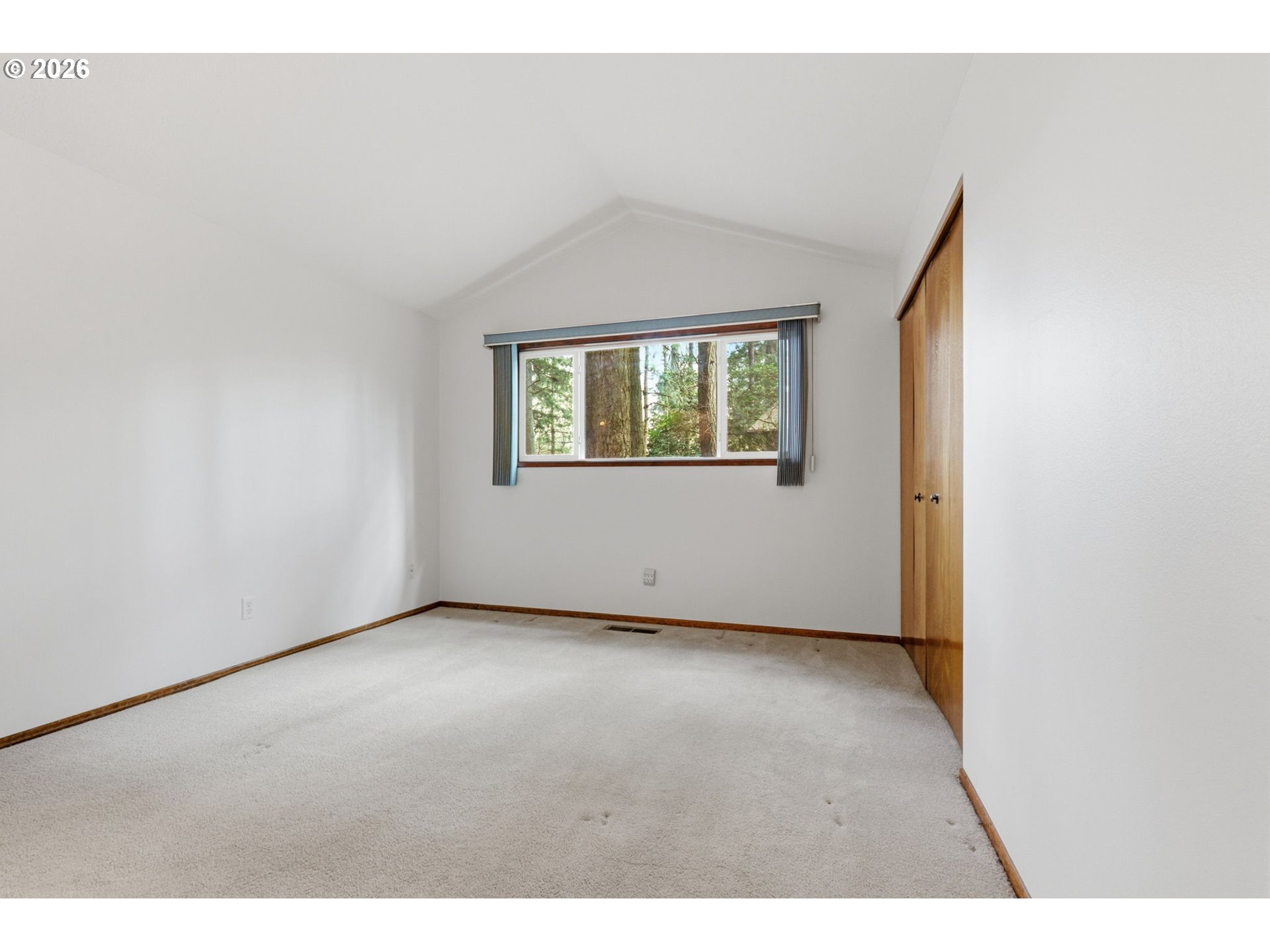 7250 Southwest 28th Court Beaverton, OR 97008 - Photo 31 of 45 a view of an empty room with a window