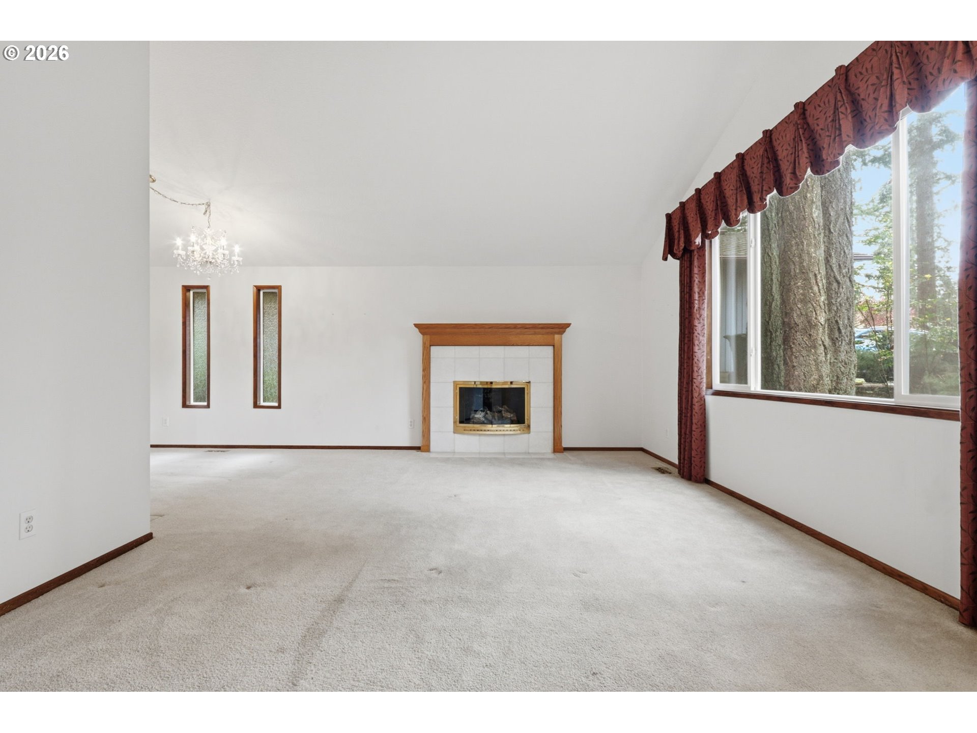 7250 Southwest 28th Court Beaverton, OR 97008 - Photo 7 of 45 a view of an empty room with a window