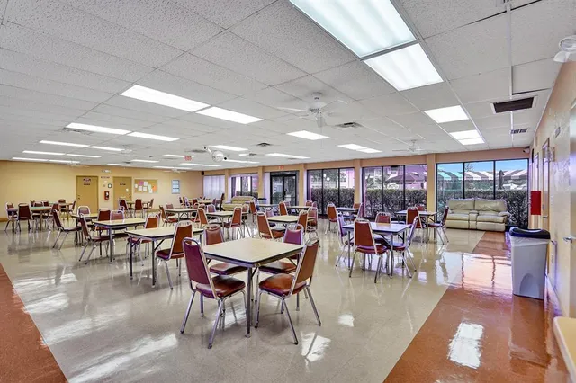 a group of people sitting at living room