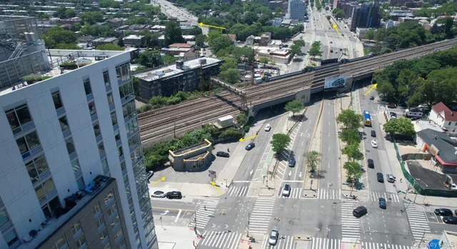 an aerial view of a city with lots of residential buildings