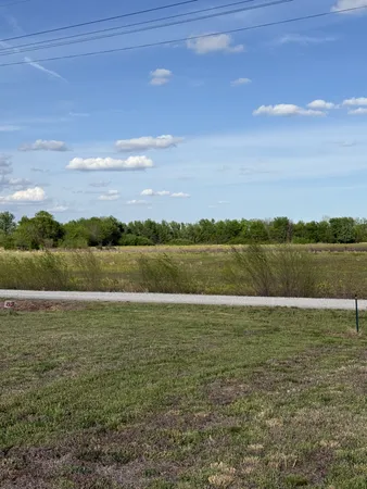 a view of an ocean beach and mountain