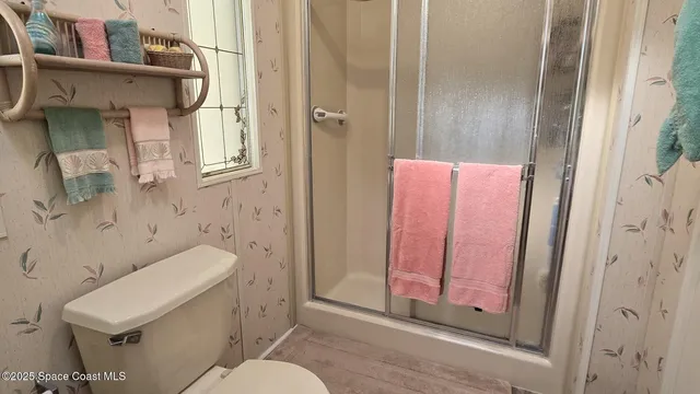a bathroom with a sink and toilet