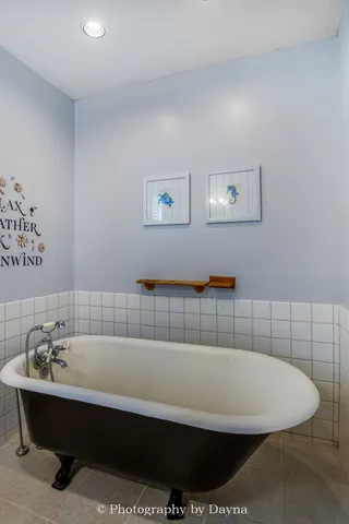 a view of a bathtub in a bathroom