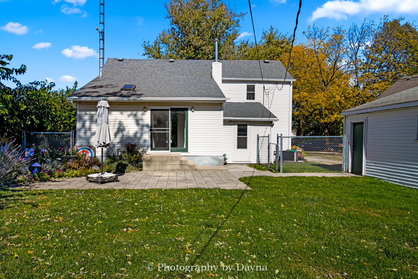 274 West Sheffield Street St. Anne, IL 60964 - Photo 29 of 32 a front view of a house with a yard