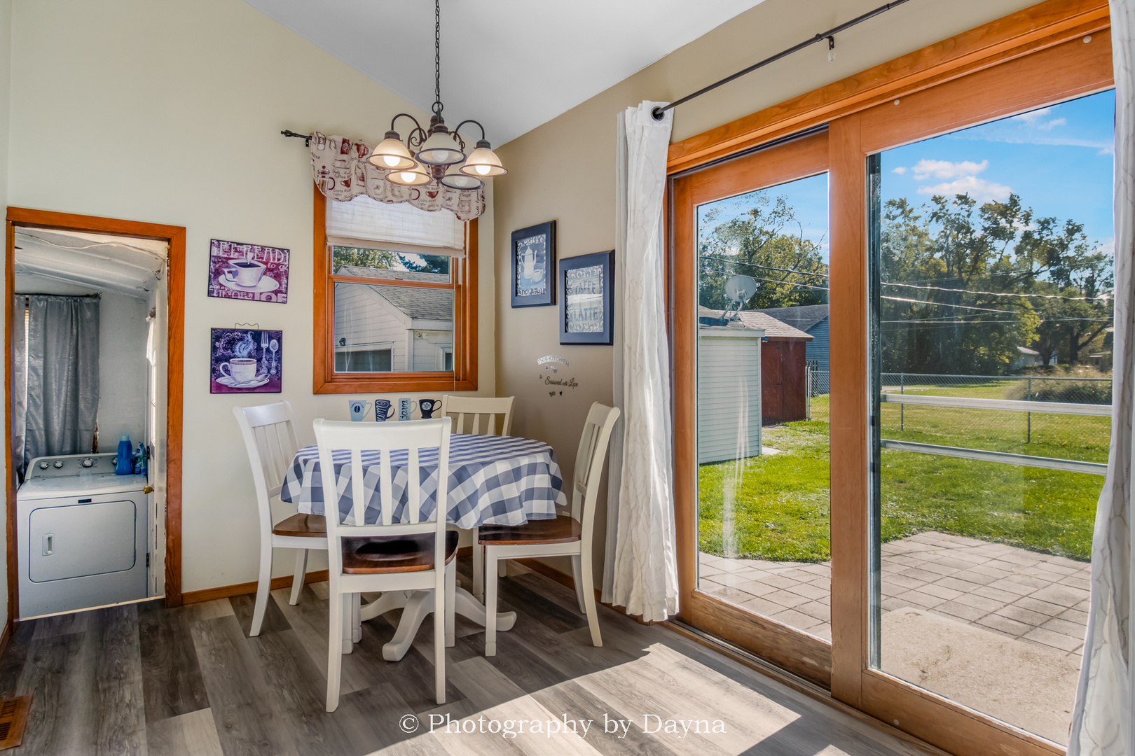 274 West Sheffield Street St. Anne, IL 60964 - Photo 3 of 32 a view of a dining room with furniture window and wooden floor