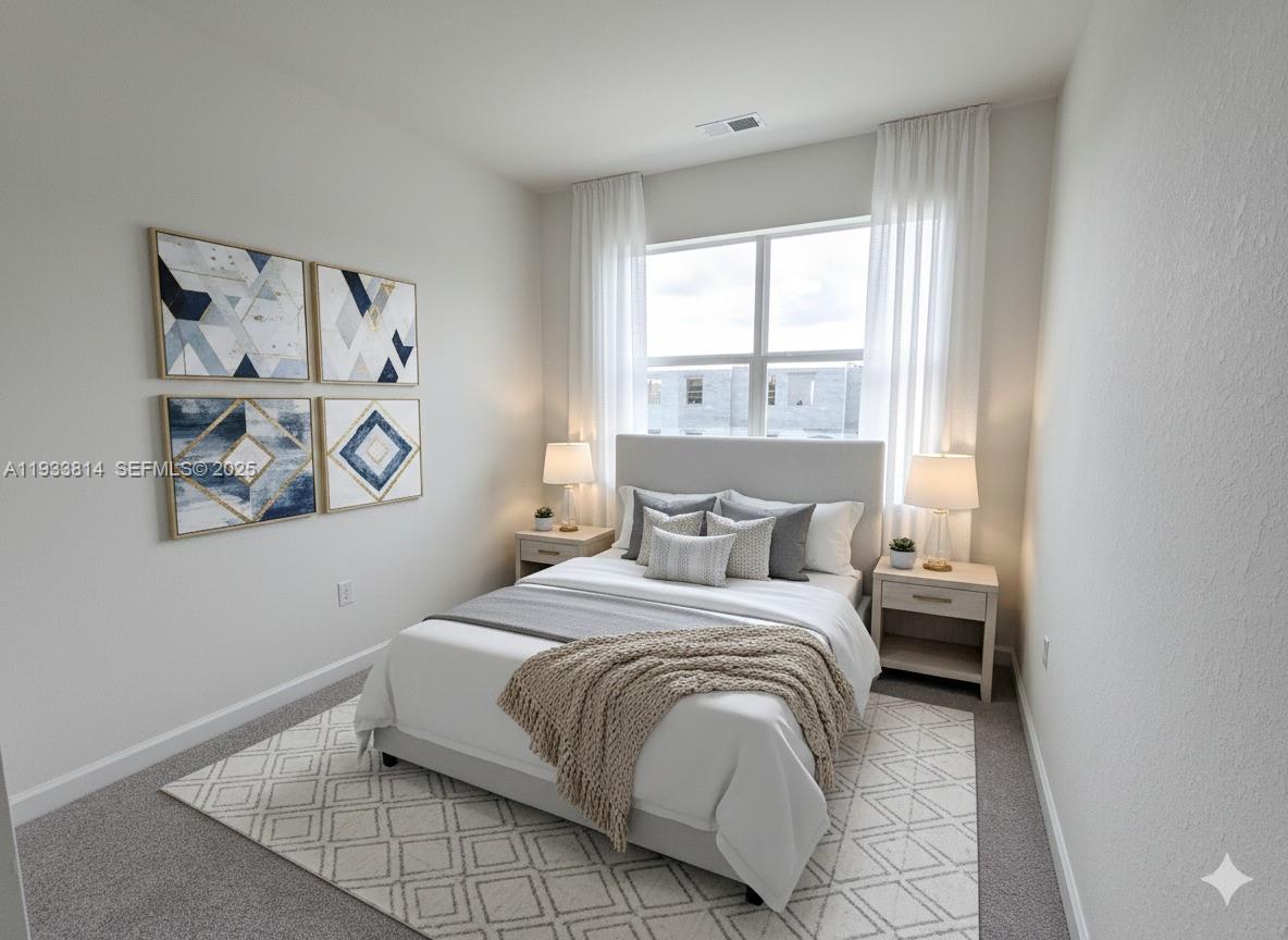 1082 Southeast 2nd Terrace, Unit 57 Homestead, FL 33034 - Photo 9 of 12 a bedroom with a bed and a window