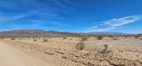 a view of lake and mountain