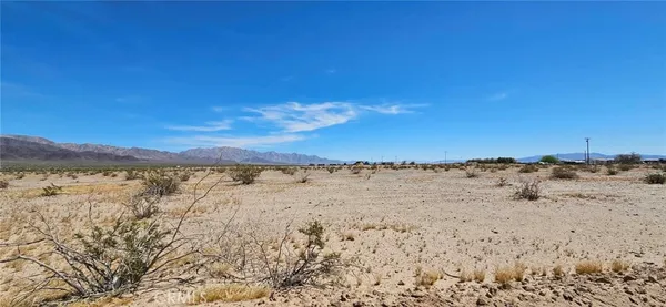 a view of lake and mountain
