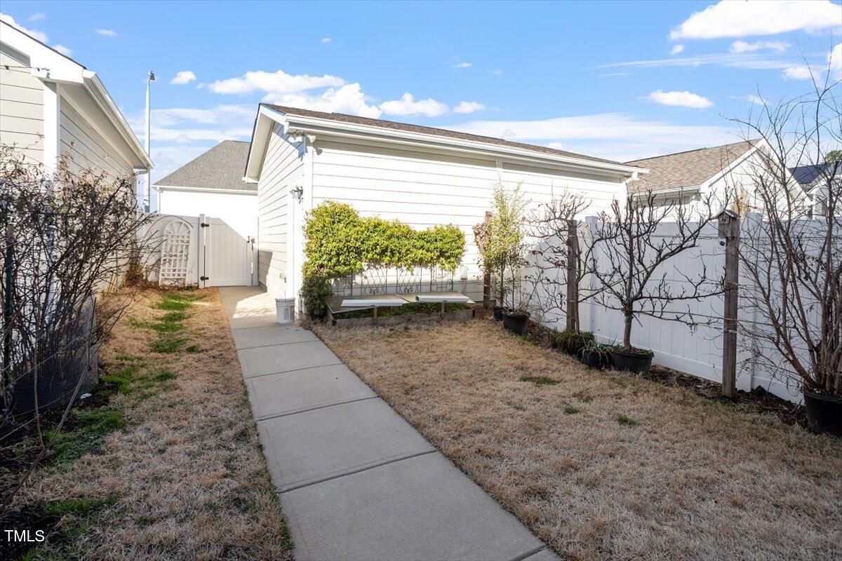 6623 Academic Avenue Raleigh, NC 27616 - Photo 32 of 50 Sidewalk to Detached Garage