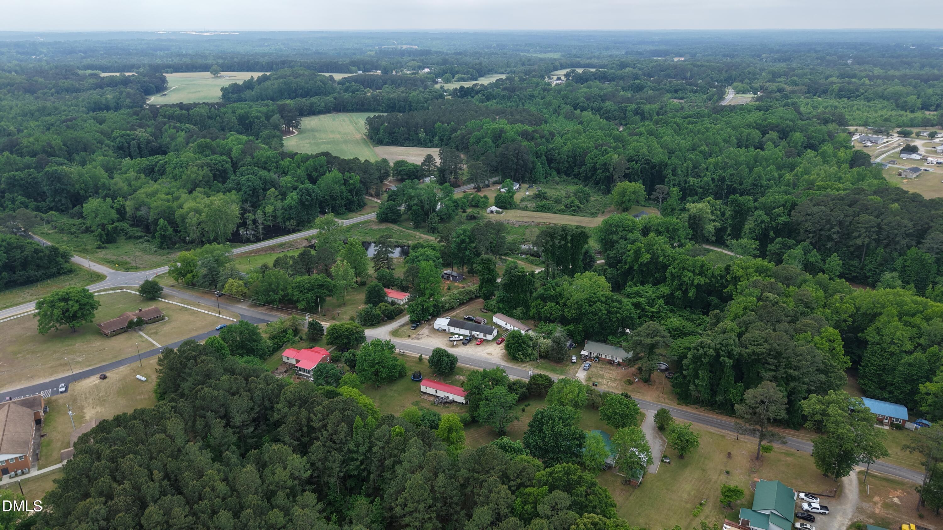 0 Sharpe Road Cameron, NC 28326 - Photo 13 of 22 an aerial view of residential house with outdoor space and trees
