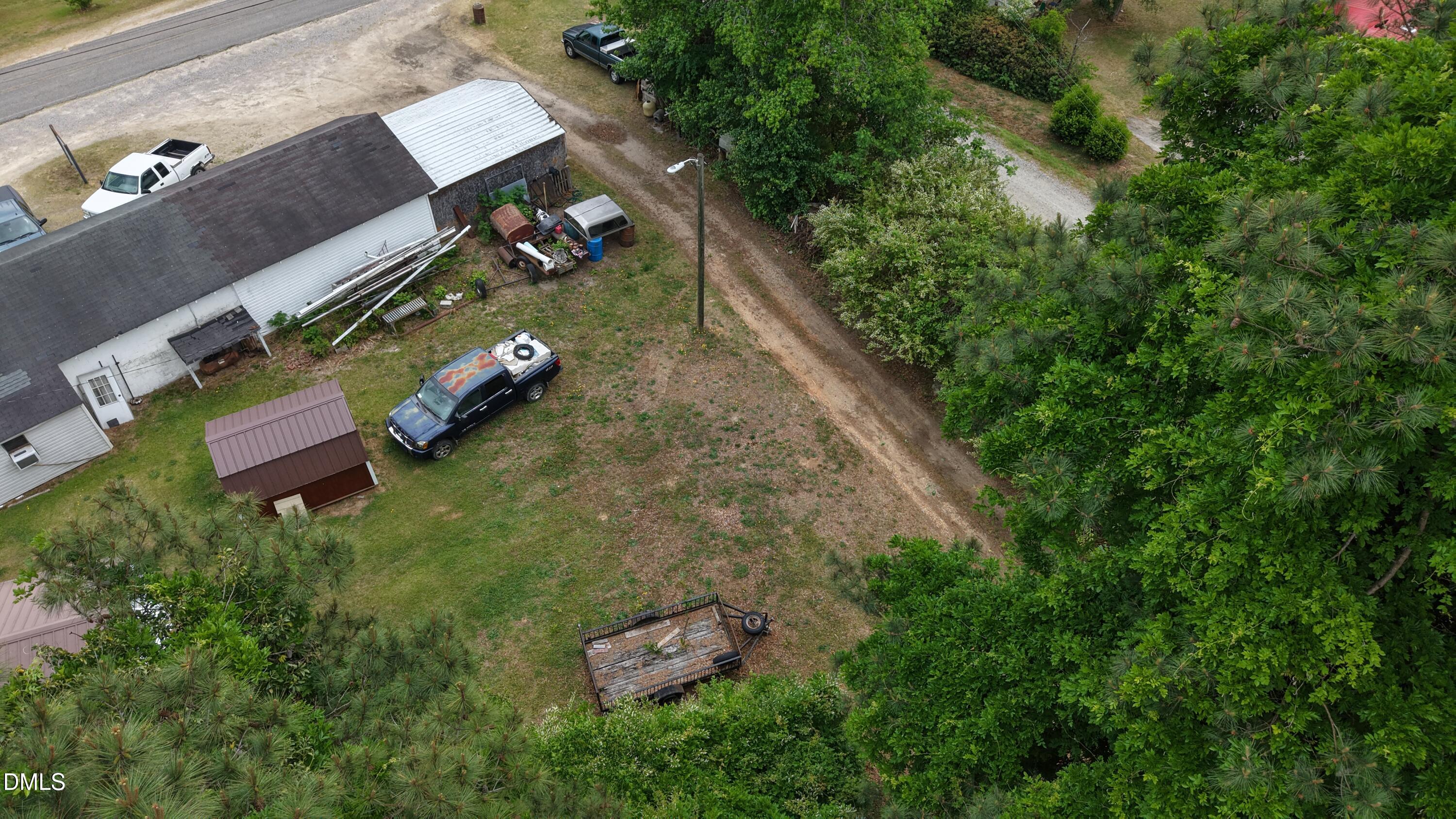 0 Sharpe Road Cameron, NC 28326 - Photo 20 of 22 an aerial view of a house with outdoor space