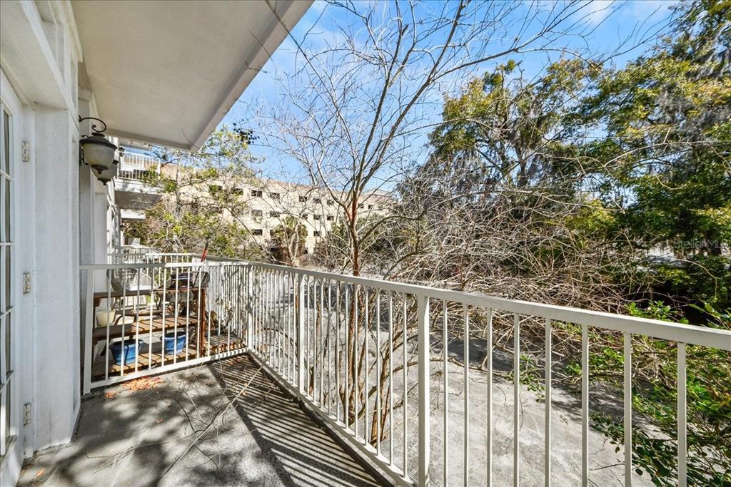 230 Southwest 2nd Avenue, Unit 207 Gainesville, FL 32601 - Photo 16 of 25 a view of balcony with wooden floor
