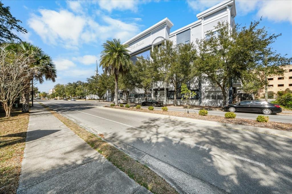 230 Southwest 2nd Avenue, Unit 207 Gainesville, FL 32601 - Photo 22 of 25 a view of a swimming pool with an outdoor seating