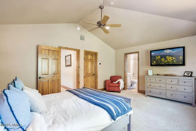 a bedroom with a bed and furniture