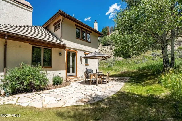 a house view with a outdoor space