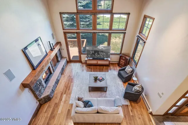 a view of an entryway with wooden floor