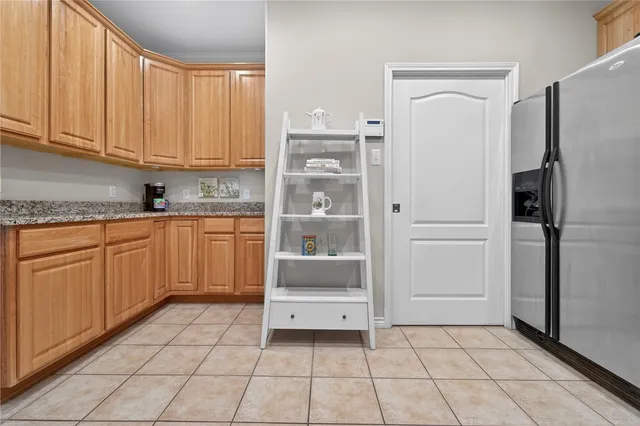 a bathroom with a sink vanity and a mirror