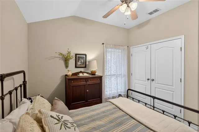 a view of a porch with furniture and garden