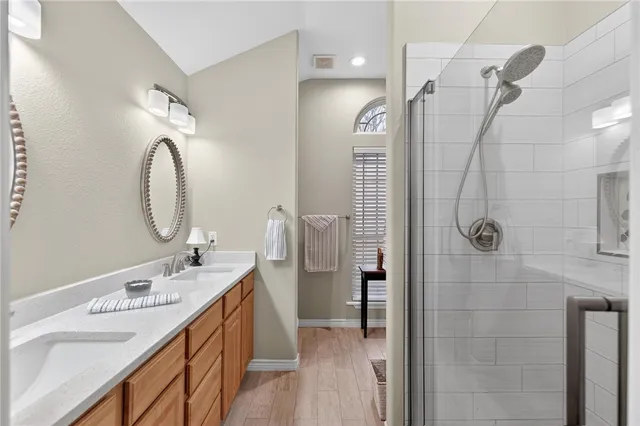 an aerial view of residential houses with outdoor space