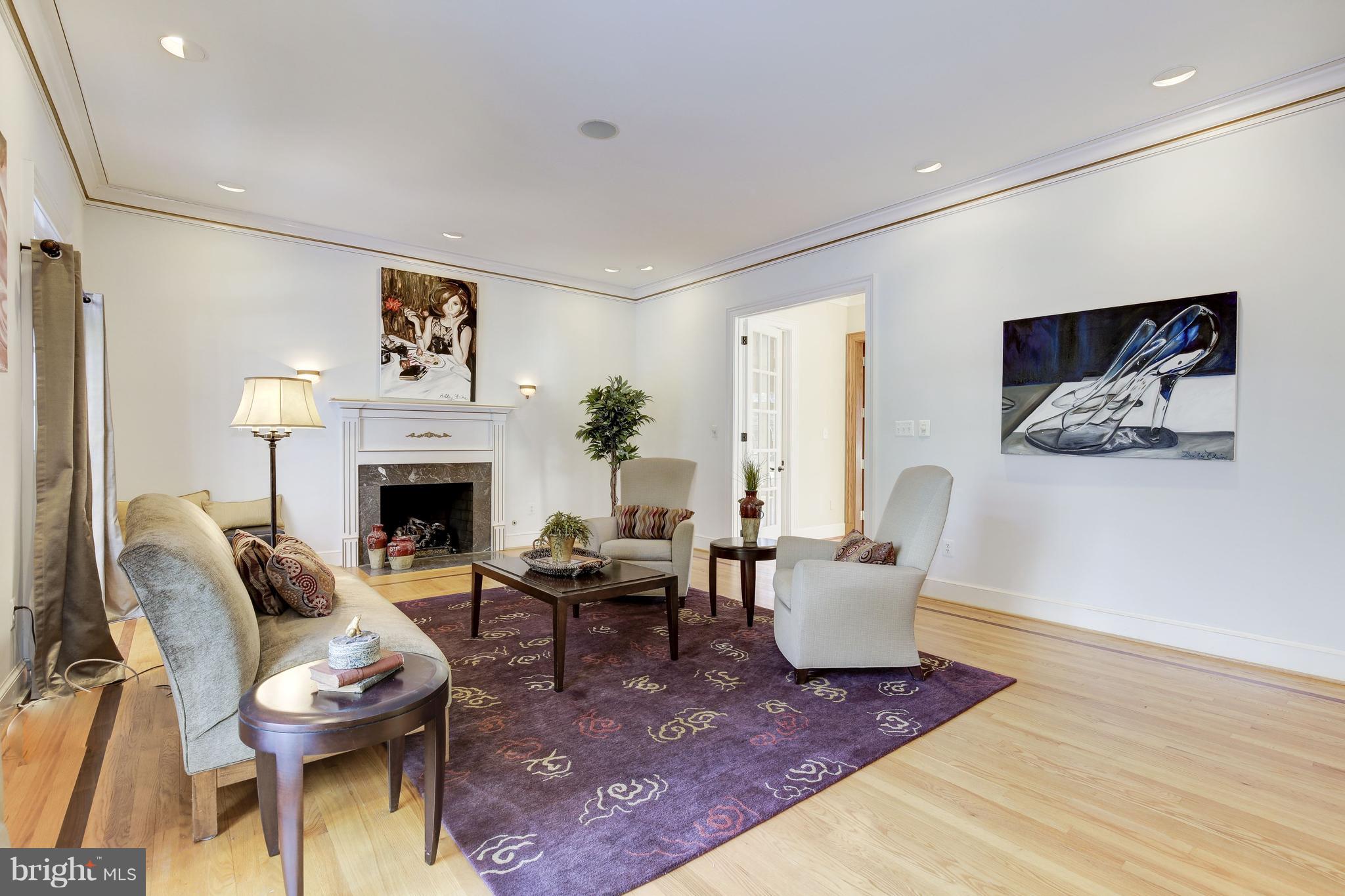 6710 Greentree Road Bethesda, MD 20817 - Photo 3 of 44 Formal living room with a fireplace