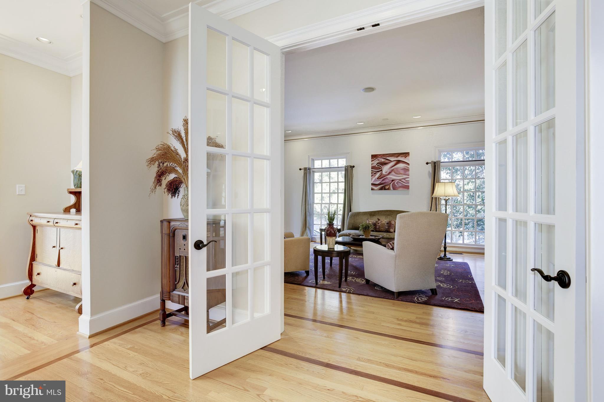 6710 Greentree Road Bethesda, MD 20817 - Photo 5 of 44 Gorgeous glass doors and transoms