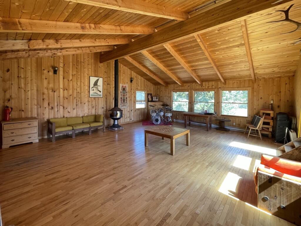 67500 Three Creek Road Sisters, OR 97759 - Photo 25 of 40 a living room with furniture and a wooden floor