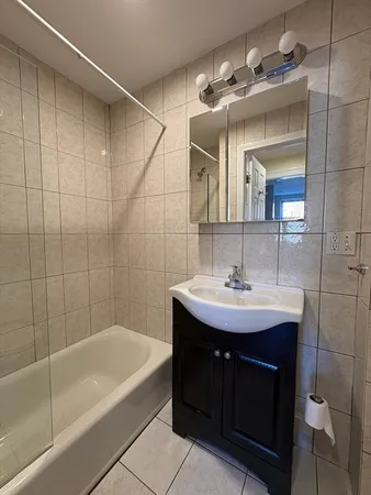 a bathroom with a sink and a bathtub