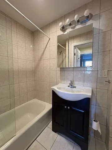 a bathroom with a sink and a bathtub