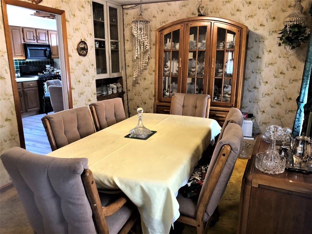 103 Turner Road Scituate, MA 02066 - Photo 4 of 15 a view of a dining room with furniture