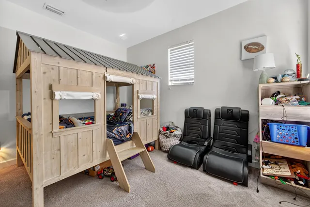 a room with furniture and a flat screen tv