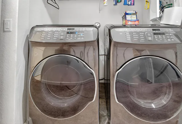 a utility room with a washer and dryer