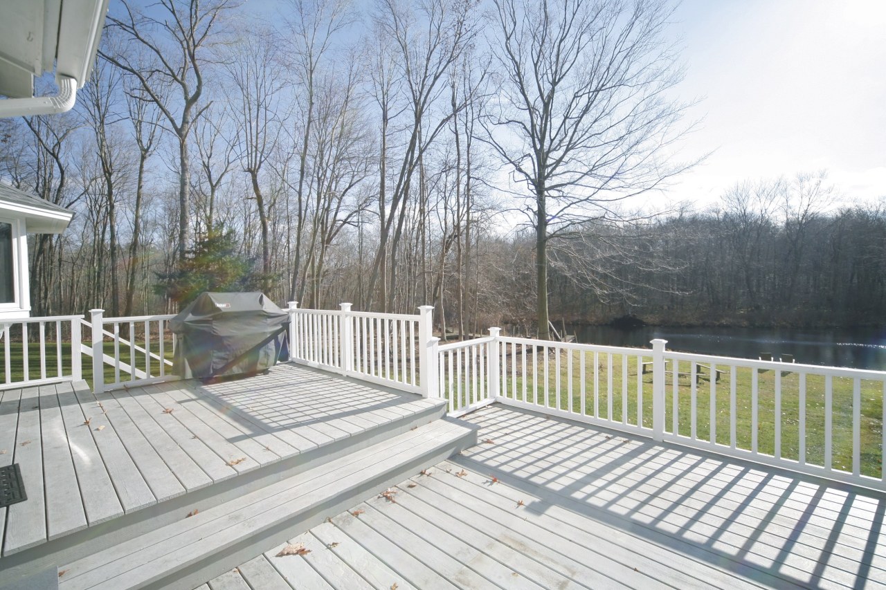 51 Journeys End Road New Canaan, CT 06840 - Photo 14 of 17 a view of a wooden roof deck