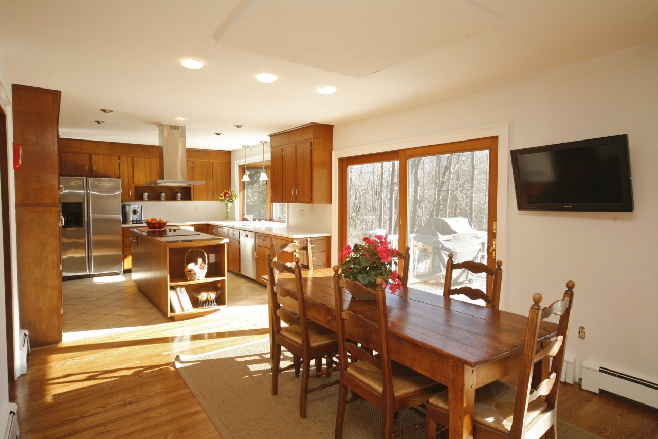 51 Journeys End Road New Canaan, CT 06840 - Photo 6 of 17 a view of a dining room with furniture window and wooden floor