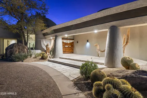 a kitchen with stainless steel appliances a sink a stove and a refrigerator