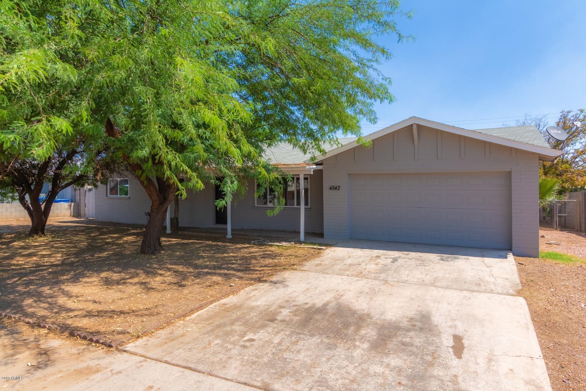 4942 West Cheery Lynn Road Phoenix, AZ 85031 - Photo 1 of 22 0001-Cherry Lynn (2)