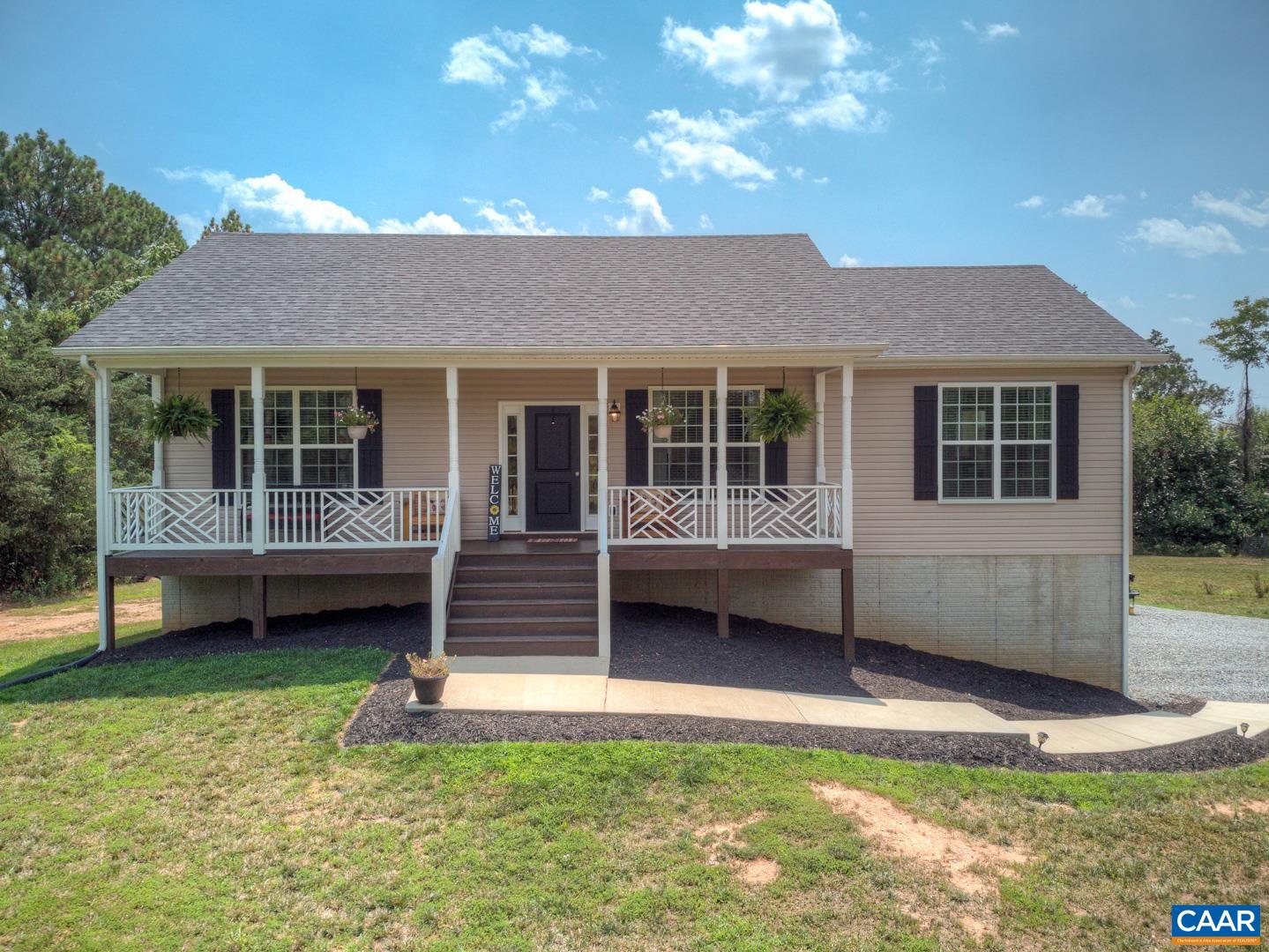 205 Cedar Run Road Ruckersville, VA 22968 - Photo 1 of 39 a view of a house with a yard balcony and a patio