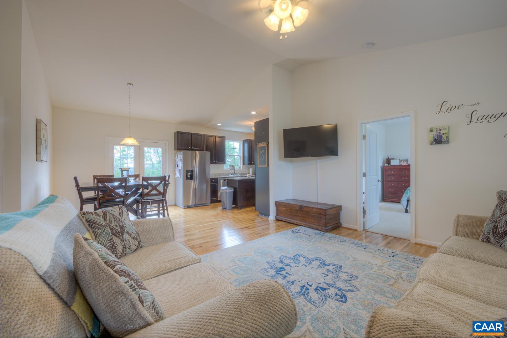 205 Cedar Run Road Ruckersville, VA 22968 - Photo 13 of 39 a living room with furniture and a flat screen tv