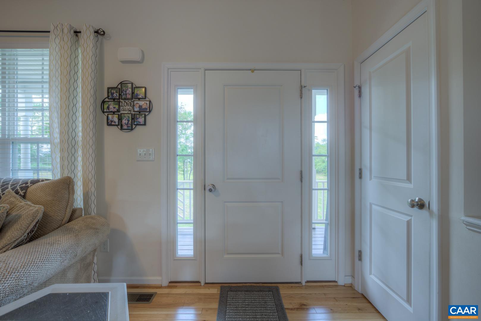 205 Cedar Run Road Ruckersville, VA 22968 - Photo 9 of 39 a living room with furniture and a window
