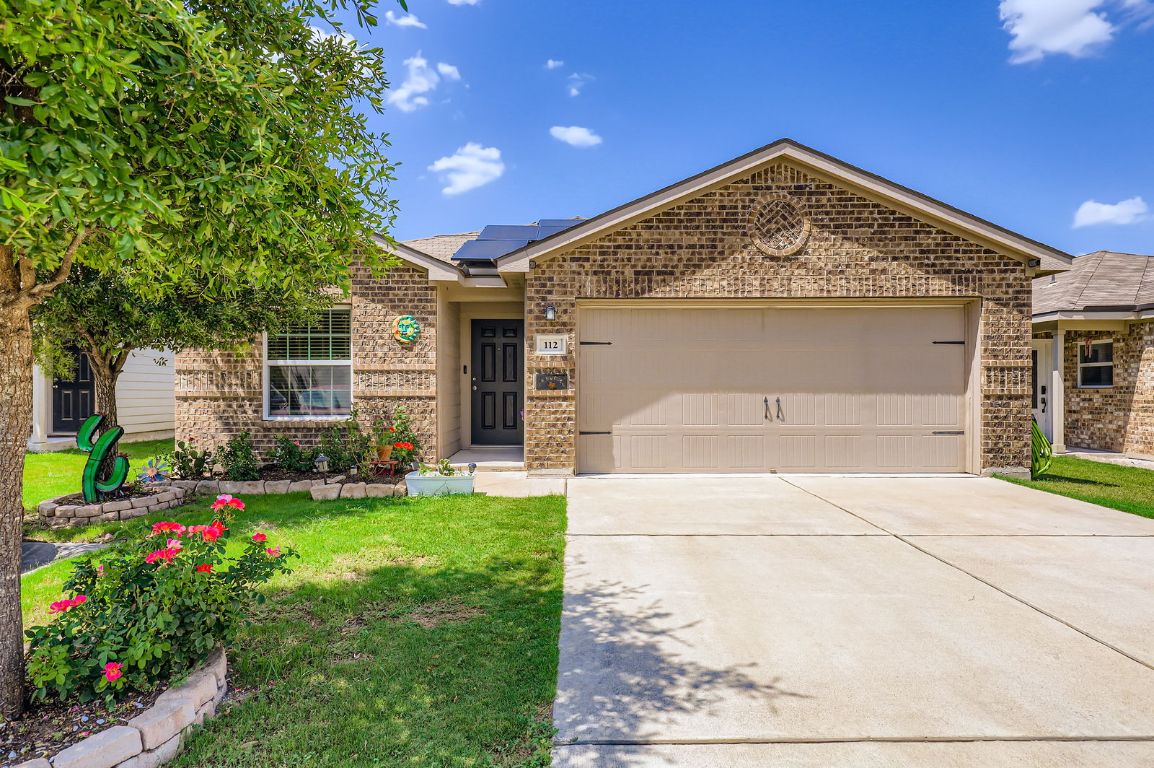 112 Niven Path Jarrell, TX 76537 - Photo 1 of 1 a view of back yard of the house