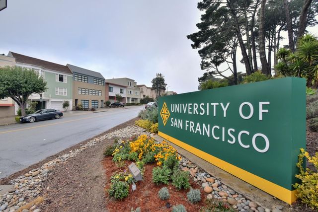 a sign on the side of the road