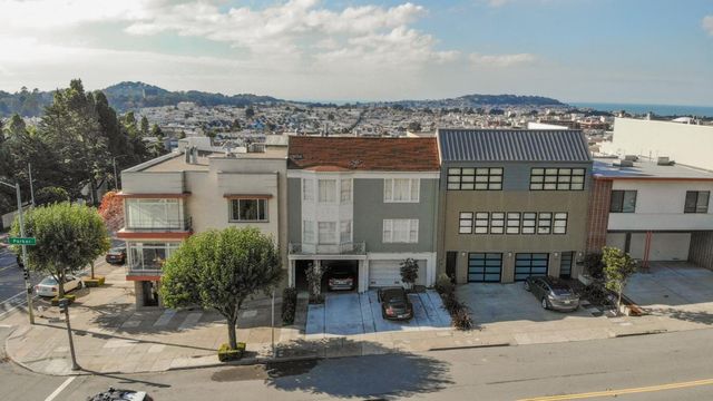 a view of a city with tall buildings