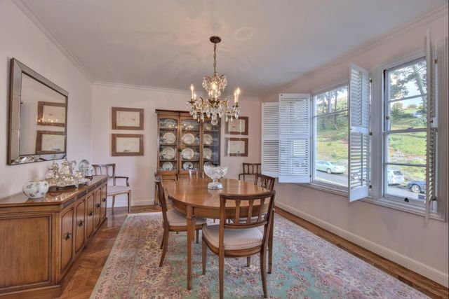 a bedroom with a large bed and a flat screen tv