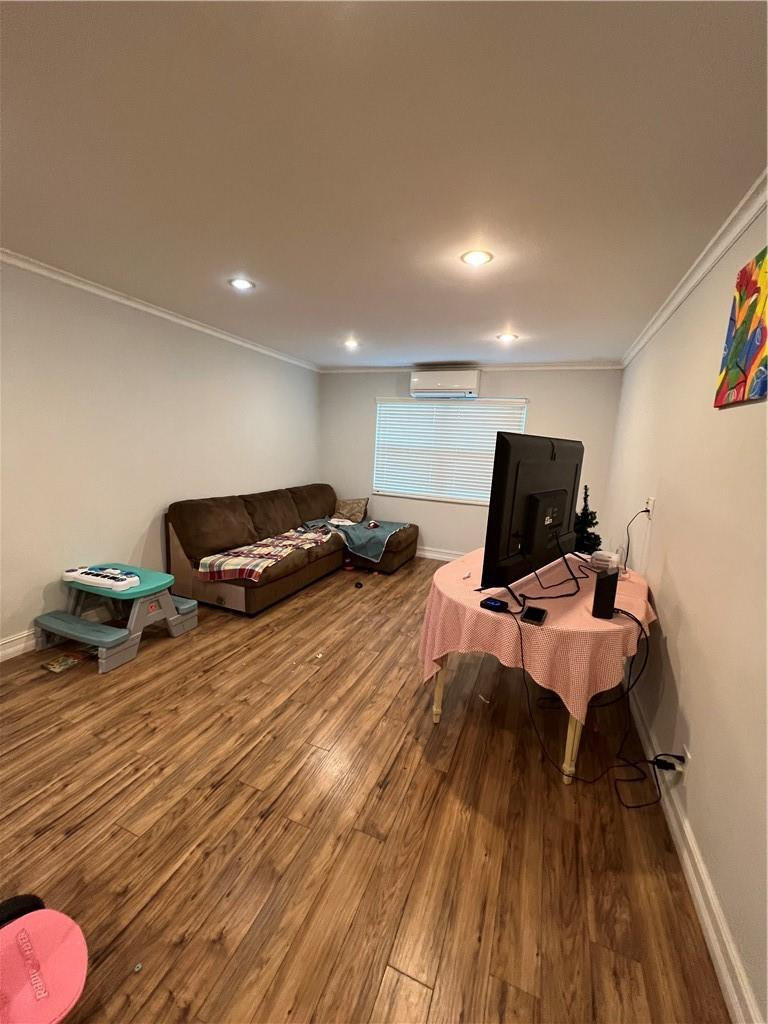 1250 East Sample Road, Unit 208 Pompano Beach, FL 33064 - Photo 11 of 19 a bed room with a bed and a chair