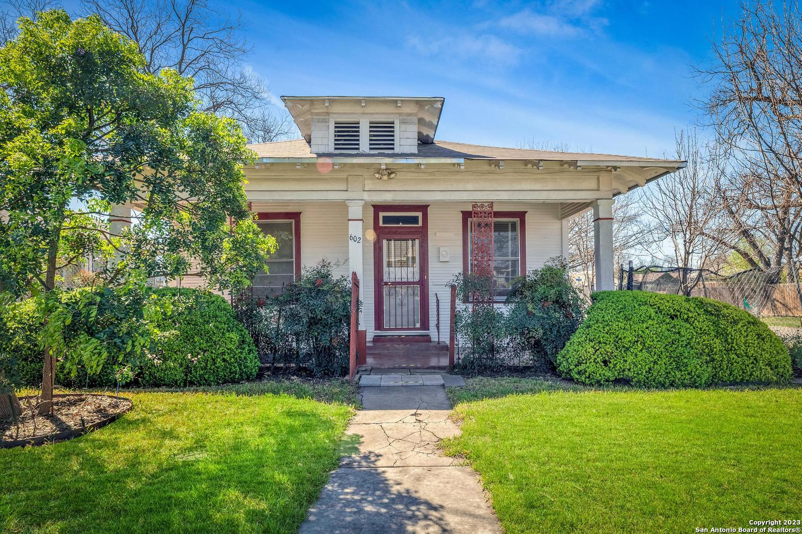 602 Devine Street San Antonio, TX 78210 - Photo 1 of 1 a front view of a house with garden