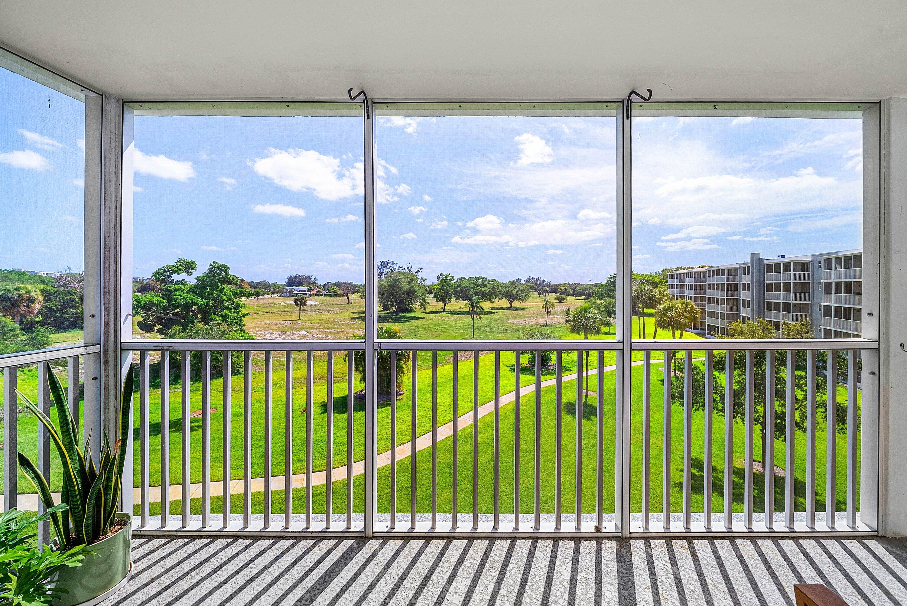 6699 Northwest 2nd Avenue, Unit 415 Boca Raton, FL 33487 - Photo 23 of 27 a view of a city from a balcony