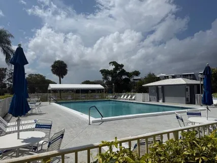 a view of a swimming pool and outdoor space