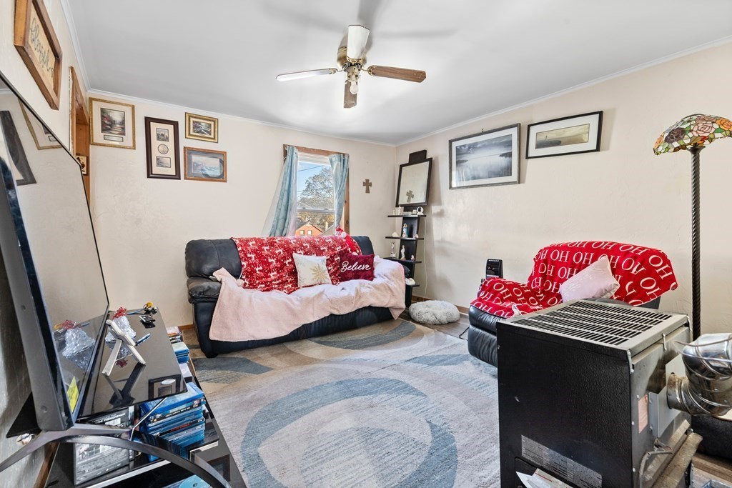 19 Myrtle Avenue Webster, MA 01570 - Photo 18 of 42 a bedroom with a bed and furniture