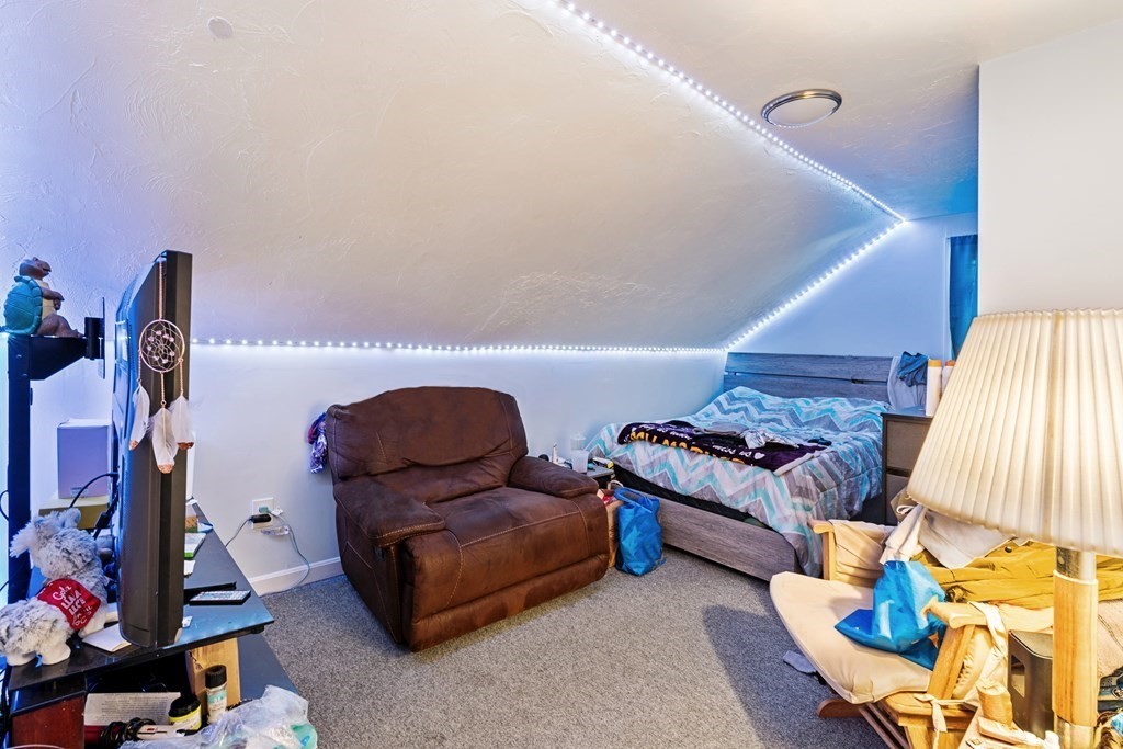 19 Myrtle Avenue Webster, MA 01570 - Photo 26 of 42 a living room with furniture and a couch